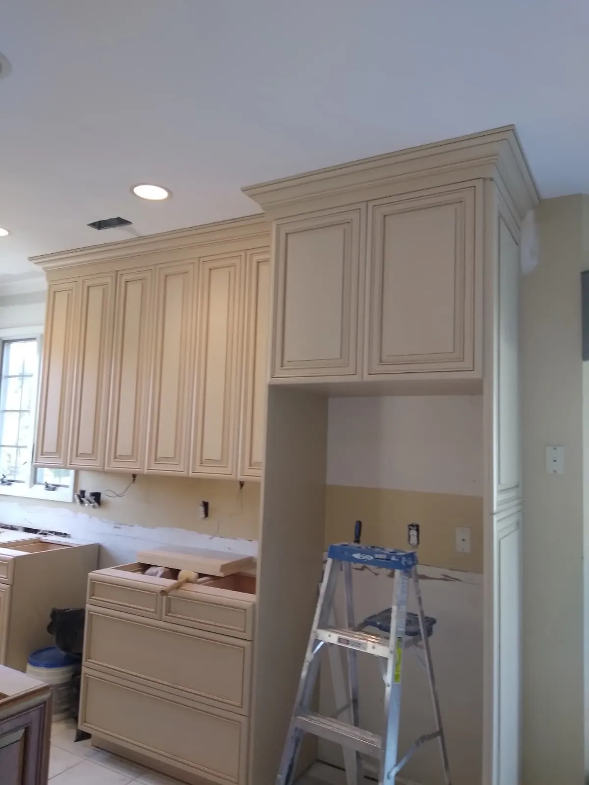 Homeowner reviewing a remodeling estimate with a contractor in New Jersey