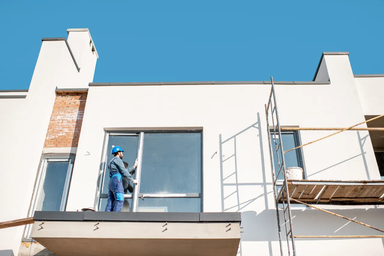 Construction worker on residential exterior in New Jersey